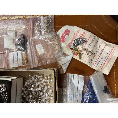 430 - A quantity of jewellery fastenings, loose beads including lapis etc.