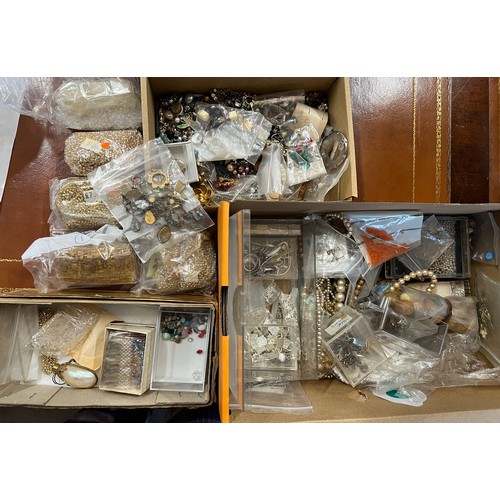 431 - A quantity of mainly small loose beads and fittings etc in two boxes.