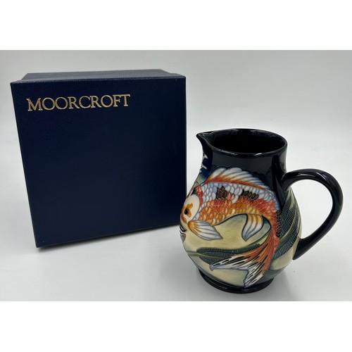 167 - A boxed Quiet Waters Moorcroft jug, dated 2002. 15cm h.