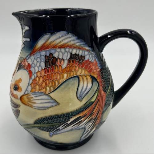 167 - A boxed Quiet Waters Moorcroft jug, dated 2002. 15cm h.