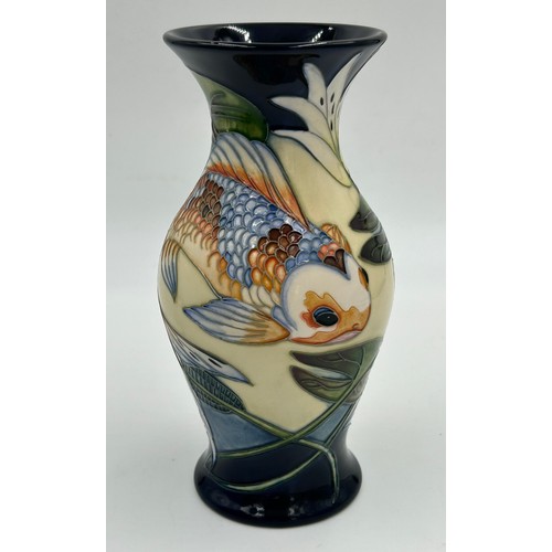 169 - A boxed Quiet Waters Moorcroft vase of baluster form, dated 2002. 20cm h.