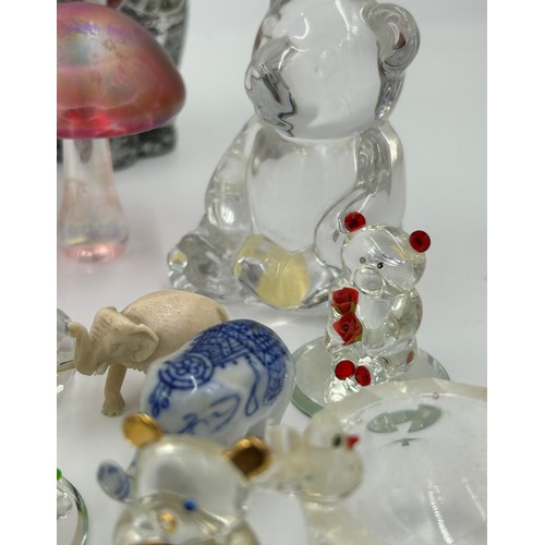 297 - Collection of miniature glass animals and other items to include elephants, Swarovski etc.