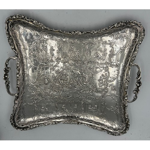 915 - A continental .800 white metal twin handled tray raised on four feet. Weight 350gm.