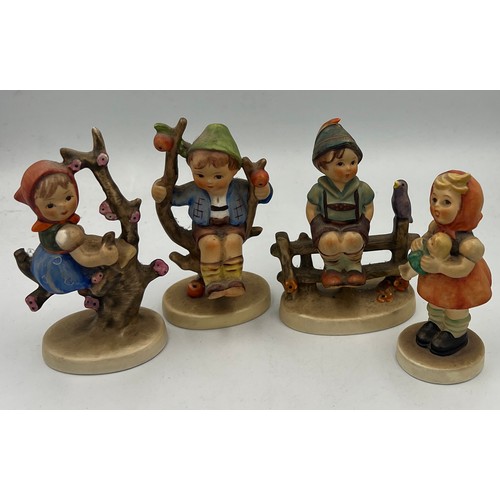 154 - Four various Hummel/Goebel figurines.