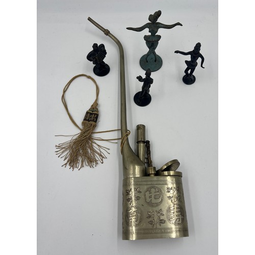 1311 - Four metal figures and a Chinese metal opium pipe.