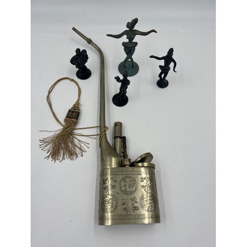 1311 - Four metal figures and a Chinese metal opium pipe.