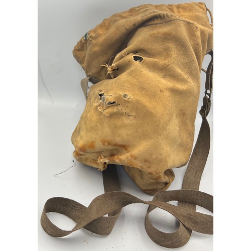 1314 - A vintage gas mask in canvas case. Marked S.G& Co Ltd. Jun. 1939.