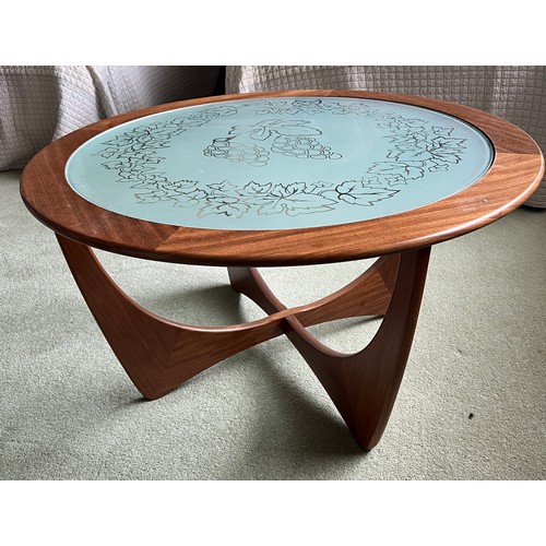 31 - A G Plan circular coffee table with etched glass top. 83cm d.