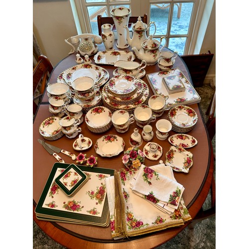 142 - A large quantity of Royal Albert Old Country Roses dinner, tea, coffee and other items to include 2 ... 