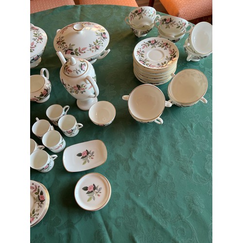 143 - A large quantity of Wedgwood Hathaway Rose coffee and dinner service comprising: coffee pot, 6 coffe... 