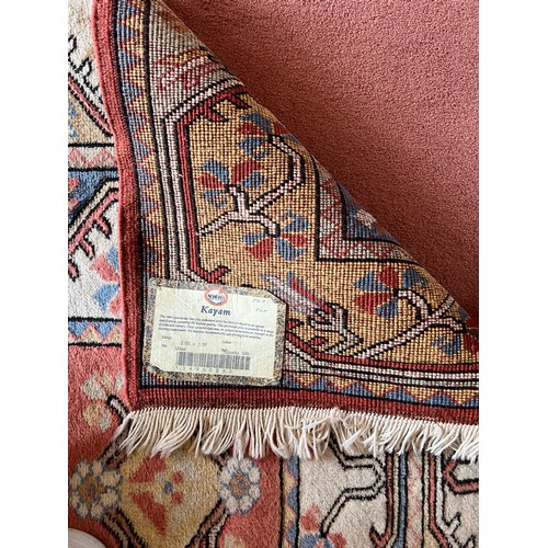 1100 - A good quality Kayam rug, 200cm x 135cm.