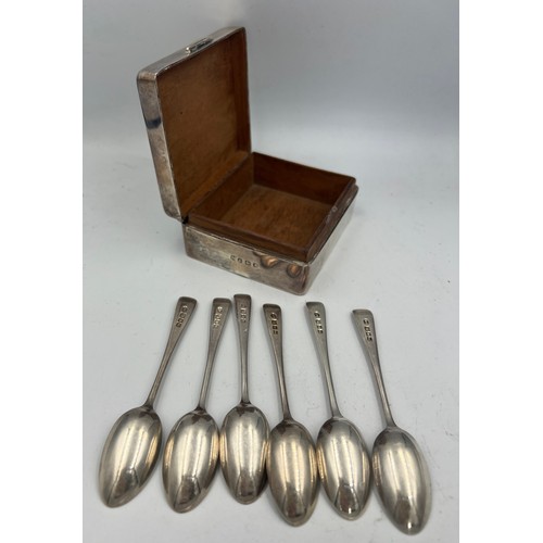 906 - A set of six silver spoons, London 1921 together with a silver cigarette box.  Weight of spoons 65.1... 