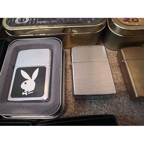 1322 - A large collection of mostly boxed Zippo lighters to include Harley Davidson, Bunny, older brass lig... 