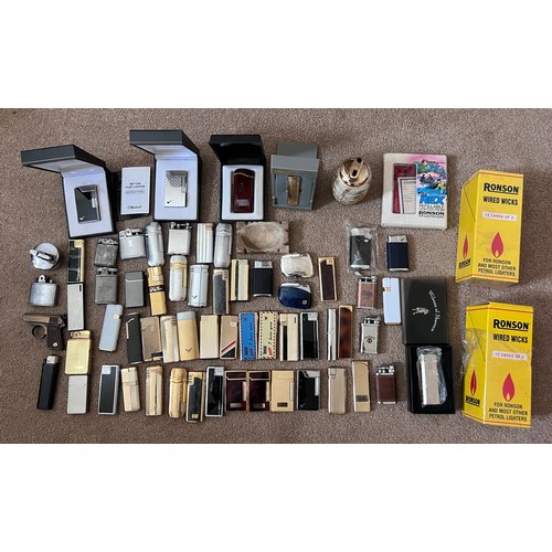 1323 - A large collection of lighters to include Ronson, Hadson, Jack Daniels etc.