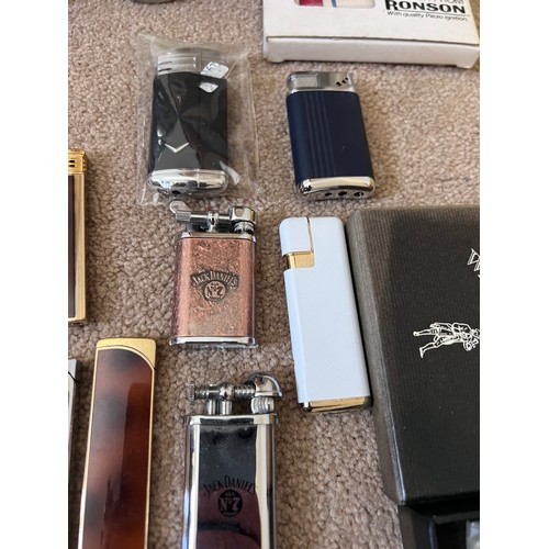 1323 - A large collection of lighters to include Ronson, Hadson, Jack Daniels etc.