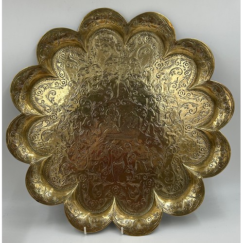 417 - Brass ware to include a scalloped tray 45cm d, small tray, bowl, galleried tray all with Eastern des... 