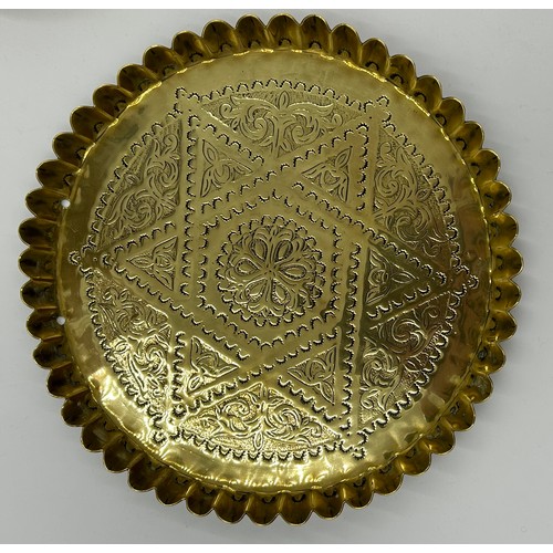 417 - Brass ware to include a scalloped tray 45cm d, small tray, bowl, galleried tray all with Eastern des... 