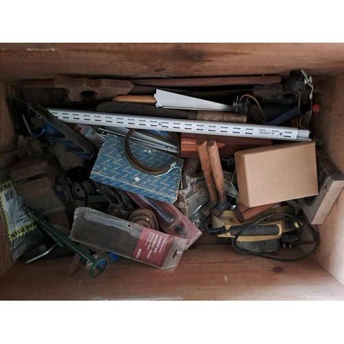 19 - A large vintage pine chest filled with an assortment of tools.