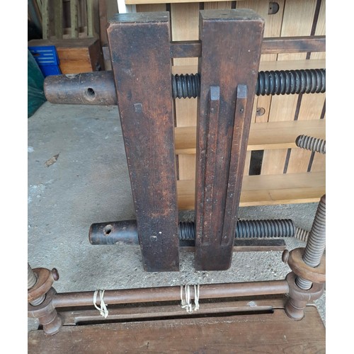 20 - A quantity of vintage wooden and metal book presses.