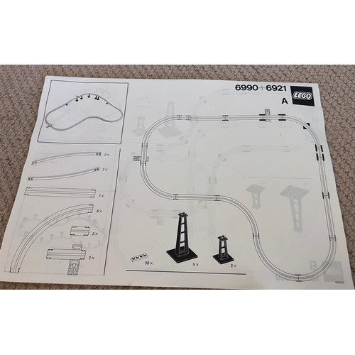 1195 - A boxed Lego 6990 Space Monorail and possible track extensions 6921.