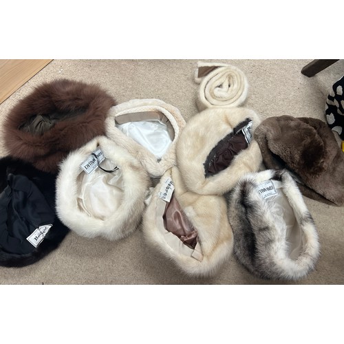 711 - Eight various vintage fur hats and a mink belt.