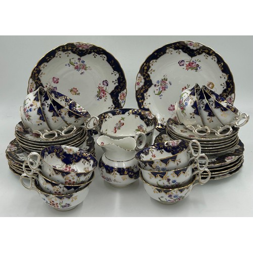 125 - English Diamond China porcelain part tea service decorated with hand painted sprays of flowers with ... 