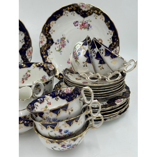 125 - English Diamond China porcelain part tea service decorated with hand painted sprays of flowers with ... 