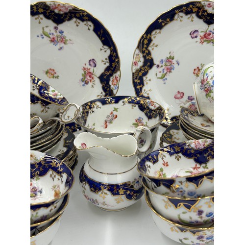 125 - English Diamond China porcelain part tea service decorated with hand painted sprays of flowers with ... 