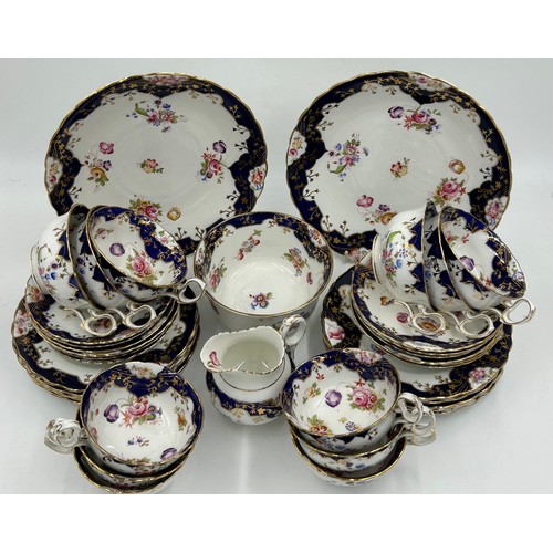 125 - English Diamond China porcelain part tea service decorated with hand painted sprays of flowers with ... 