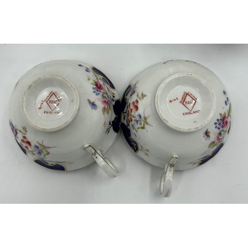 125 - English Diamond China porcelain part tea service decorated with hand painted sprays of flowers with ... 