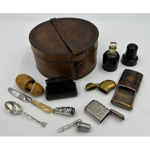 1327 - A miscellany to include : leather collar box, silver plated etui, ebony cased scent bottle, horn snu... 