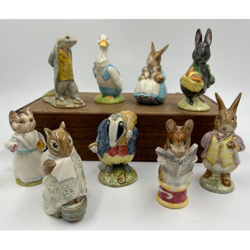 112 - Beswick Beatrix Potter figures to include Sir Issac Newton Little Black Rabbit, Mrs Rabbit and Bunni... 