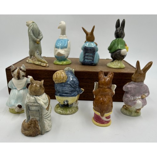 112 - Beswick Beatrix Potter figures to include Sir Issac Newton Little Black Rabbit, Mrs Rabbit and Bunni... 