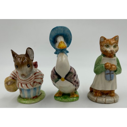 113 - Ten Beswick Beatrix Potter figures comprising: Lady Mouse, Hunca Munca Sweeping, Samuel Whiskers, Mr... 