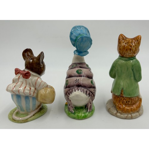 113 - Ten Beswick Beatrix Potter figures comprising: Lady Mouse, Hunca Munca Sweeping, Samuel Whiskers, Mr... 