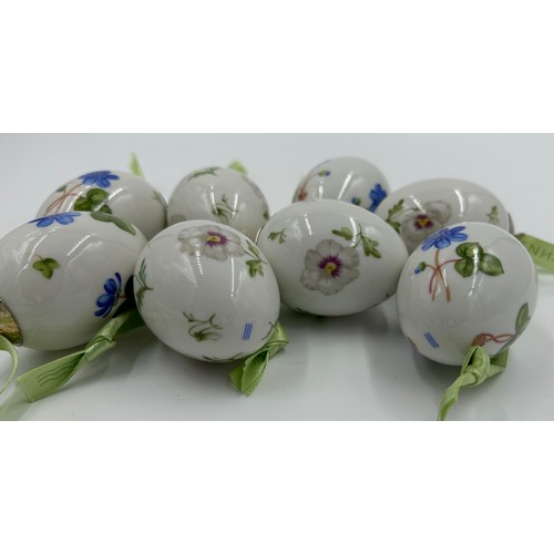 120 - A collection of eight Royal Copenhagen porcelain eggs, 4 x blue hepatica and 4 x pansy. 5.5cm.