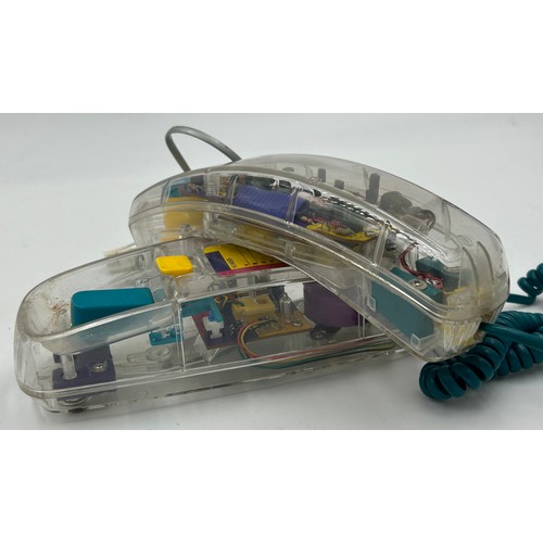 1331 - A miscellany to include a circa 1990's Mybelle Spotlight 753 illuminating transparent telephone, a B... 