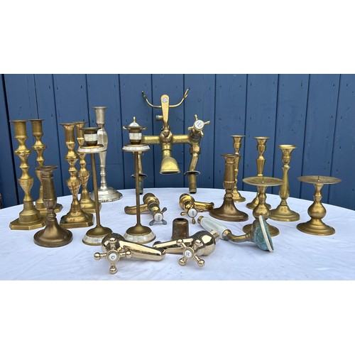 416 - A quantity of brass items to include T.A. Harris Ltd, London bath & shower tap, 2 sets of taps and v... 