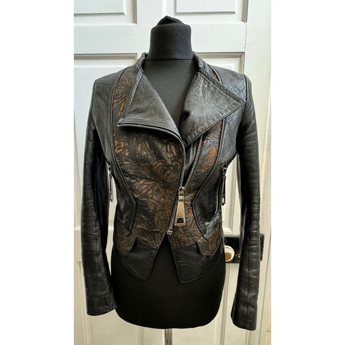 702 - A real black leather jacket by Deja - Vu along with a genuine black leather Gucci Marmont bag. Jacke... 