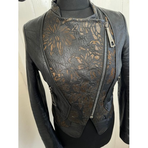 702 - A real black leather jacket by Deja - Vu along with a genuine black leather Gucci Marmont bag. Jacke... 