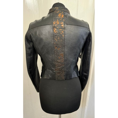 702 - A real black leather jacket by Deja - Vu along with a genuine black leather Gucci Marmont bag. Jacke... 