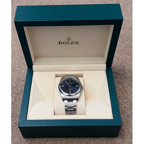 758 - A gentleman's Rolex Oyster Perpetual wristwatch in stainless steel mounts, model 114300 (blue) seria... 