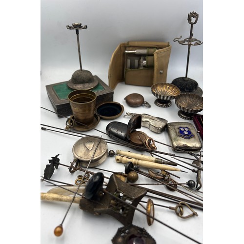 1333 - A miscellaneous lot to include a quantity of hat and stick pins, including Charles Horner silver, Fr... 