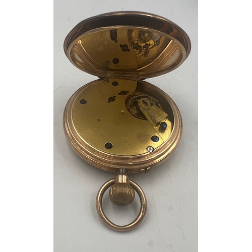 756 - A nine carat gold cased pocket watch with subsidiary seconds dial. 5cm d. Weight 90.3gm. 158439 insc... 