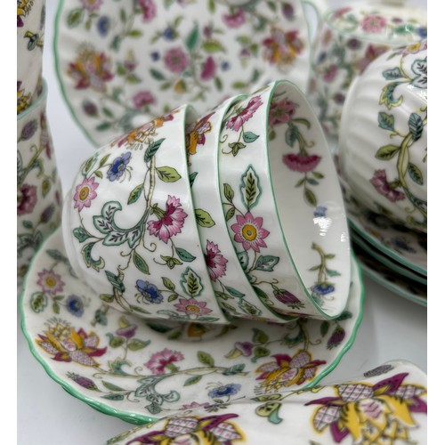 107 - Minton Haddon Hall part tea service to include teapot, 4 x breakfast cups and saucers, 6 x beakers, ... 