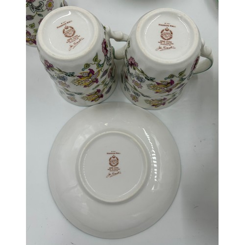 107 - Minton Haddon Hall part tea service to include teapot, 4 x breakfast cups and saucers, 6 x beakers, ... 