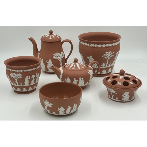 109 - A collection of Wedgwood Terracotta Jasper Ware pottery to include a coffee pot 18cm h, a teapot 11c... 