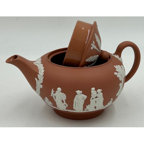 109 - A collection of Wedgwood Terracotta Jasper Ware pottery to include a coffee pot 18cm h, a teapot 11c... 