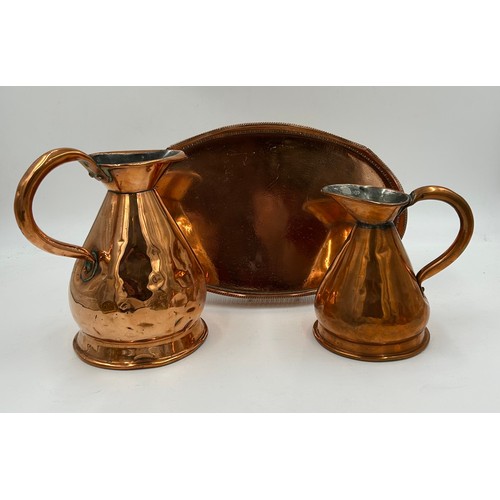 419 - Various copper and brass items to include: a planter with ring and lion handles 21.5cm h, an urn wit... 