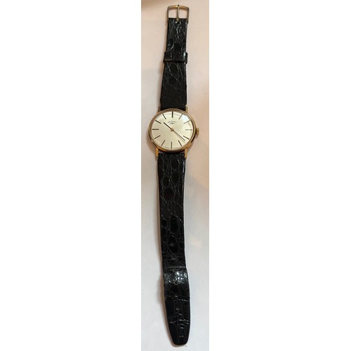 799 - A 9ct gold gentleman's Rotary wristwatch on black leather strap, engraved to back British Rail L.N.F... 